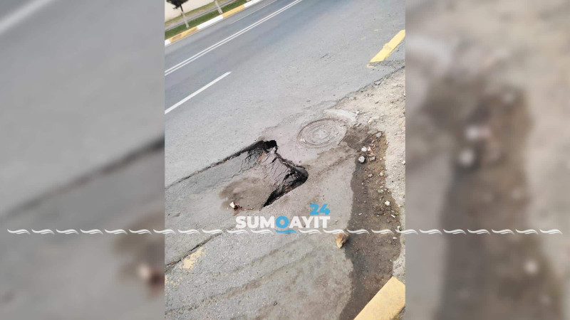 Asfalt örtüyü çatlayıb: bu hal sürücülərə təhlükə yaradır