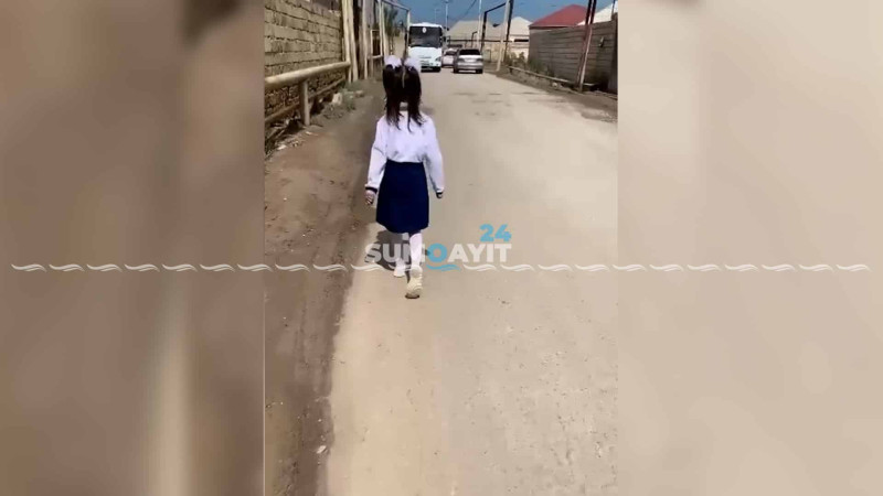 Sakinləri təhlükəyə salan məktəb yolu