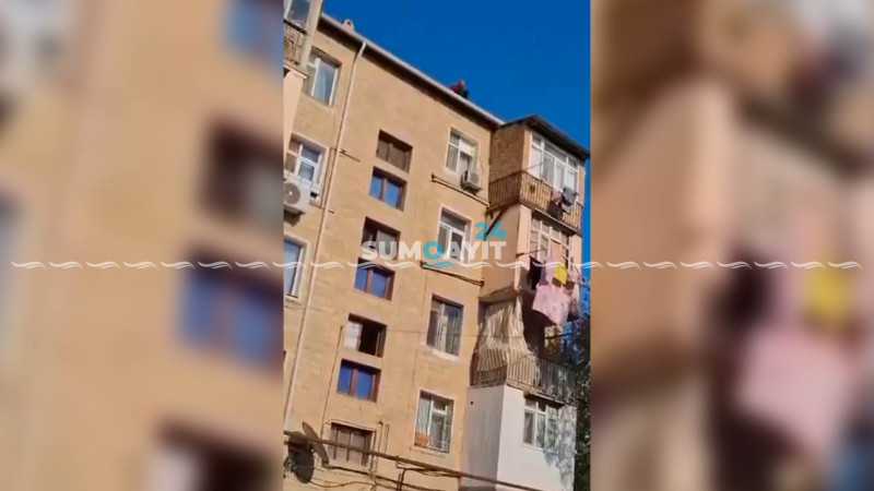Kişi damdan atılmaq istəyib