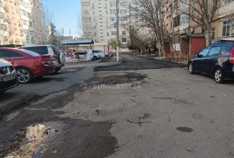 Sumqayıtda ərazini KORLAYAN yarımçıq asfaltlanma