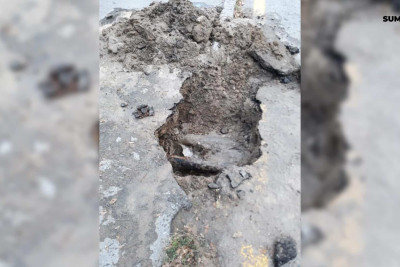 Sumqayıtda şirin su küçə ilə axıb gedir