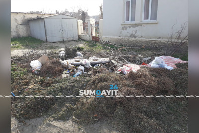 Uşaq bağçasının yanında tullantılar yığılır
