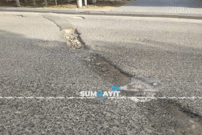 9-cu mikrorayonda sürücüləri maddi ziyana salan yol var