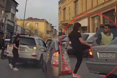 “Parkovşik”i döyən qadının kimliyi bəlli olub
