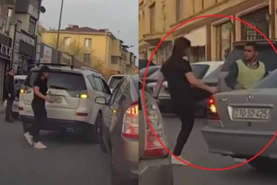 “Parkovşik”ə şiddət göstərən sürücü qadın polisə çağırılıb
