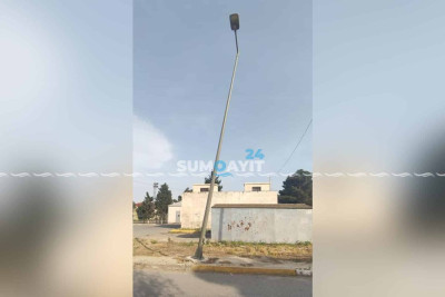 İşıq və elektrik dirəkləri sakinləri narahat edir