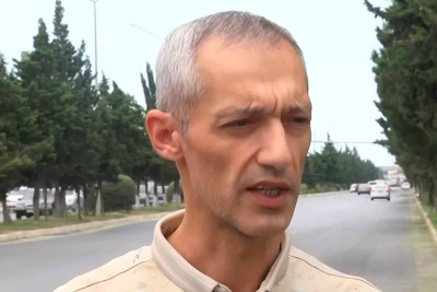 Qadına təpik atan sürücü işinə qaytarılıb