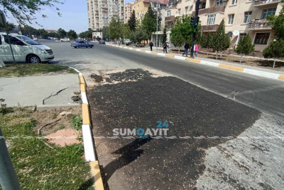 Asfaltlanmasına cəhd göstərilən piyada keçidi