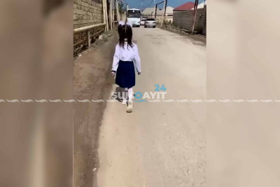 Sakinləri təhlükəyə salan məktəb yolu