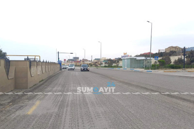 Novxanıda avtomobil yolu təmir edilir