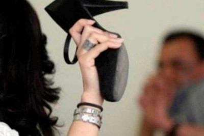 Xəyanətə görə ərinə əl qaldıran qadın məsuliyyətdən azad edildi