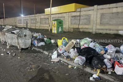 Günlərlə zibildən təmizlənməyən ərazi