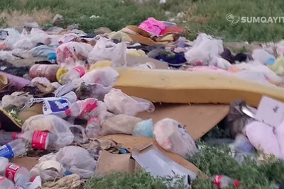 Xəzər bağları zibil poliqonunu xatırladır